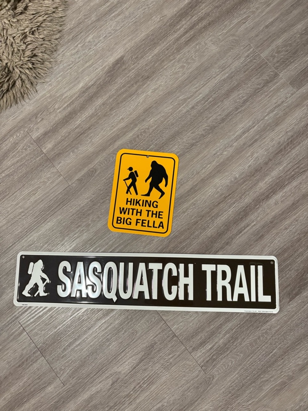 REI Yellow Sasquatch Hiking Trail Signs